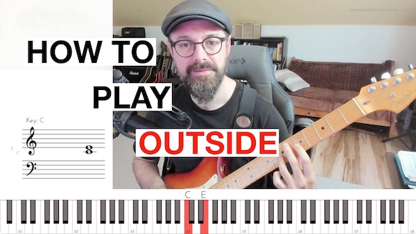 Guitar player demonstrating outside pentatonic phrases with notes shifting one fret above and below the scale